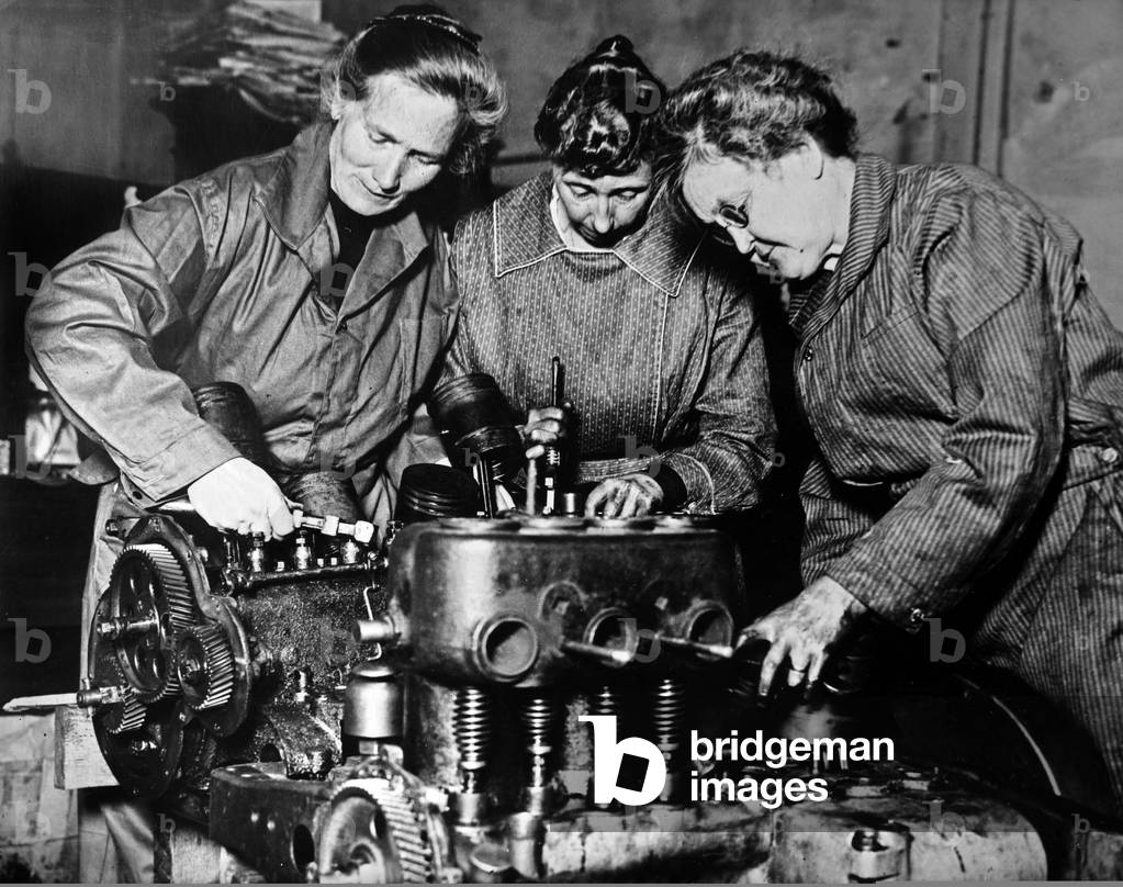 3 old women repairing motor of a car, Los Angeles, c. 1930 (photo)