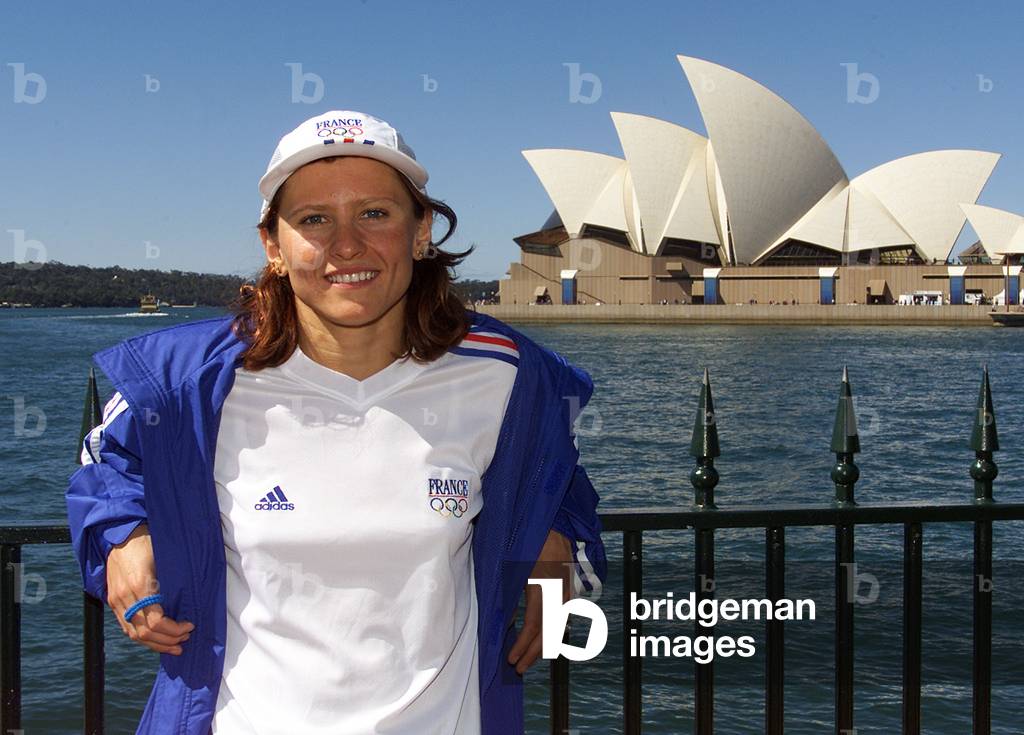 France's Olympic swimmer Roxana Maracineanu visits Sydney Harbour and its opera house,  September 12.., 2000-0