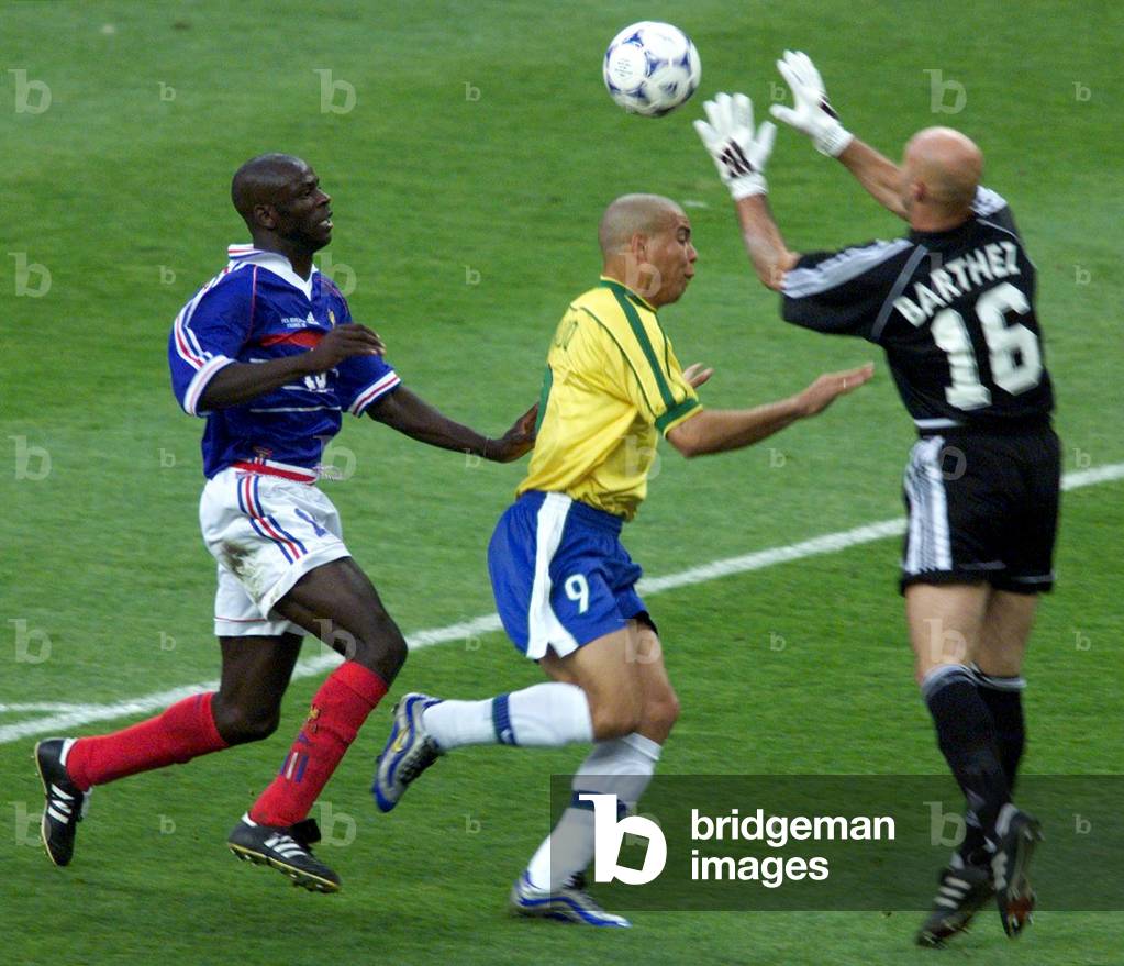 image-of-french-goalkeeper-fabien-barthez-r-jumps-to-make-a-save