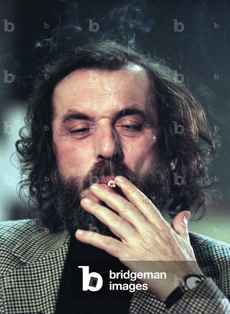 a drag of a cigarette Image of Opposition leader Vuk Draskovic takes a drag from his cigarette a drag of a cigarette Image of Opposition leader Vuk Draskovic takes a drag from his cigarette