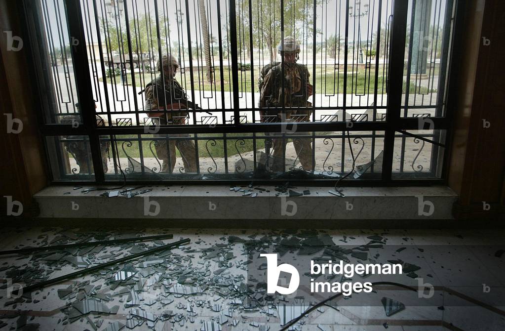 Image of BRITISH ROYAL MARINES FROM 3 COMMANDO BRIGADE PATROL OUTSIDE THE
