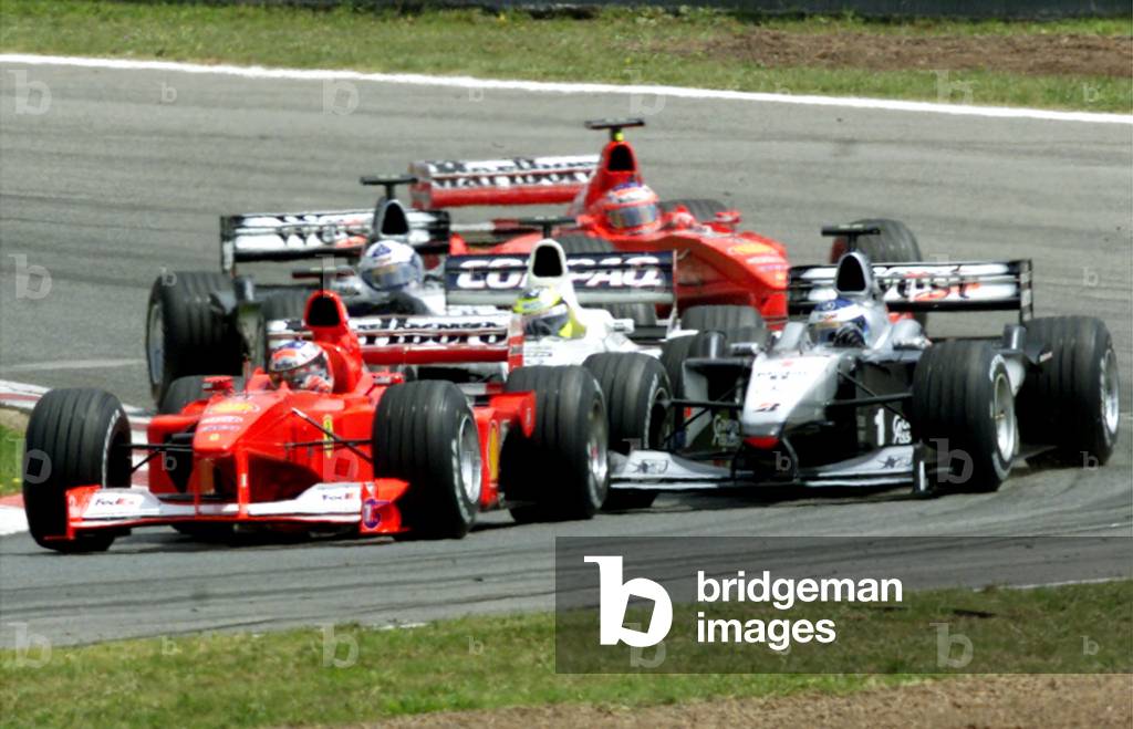Image of GERMAN MICHAEL SCHUMACHER LEADS CAR AT THE START OF SPANISH