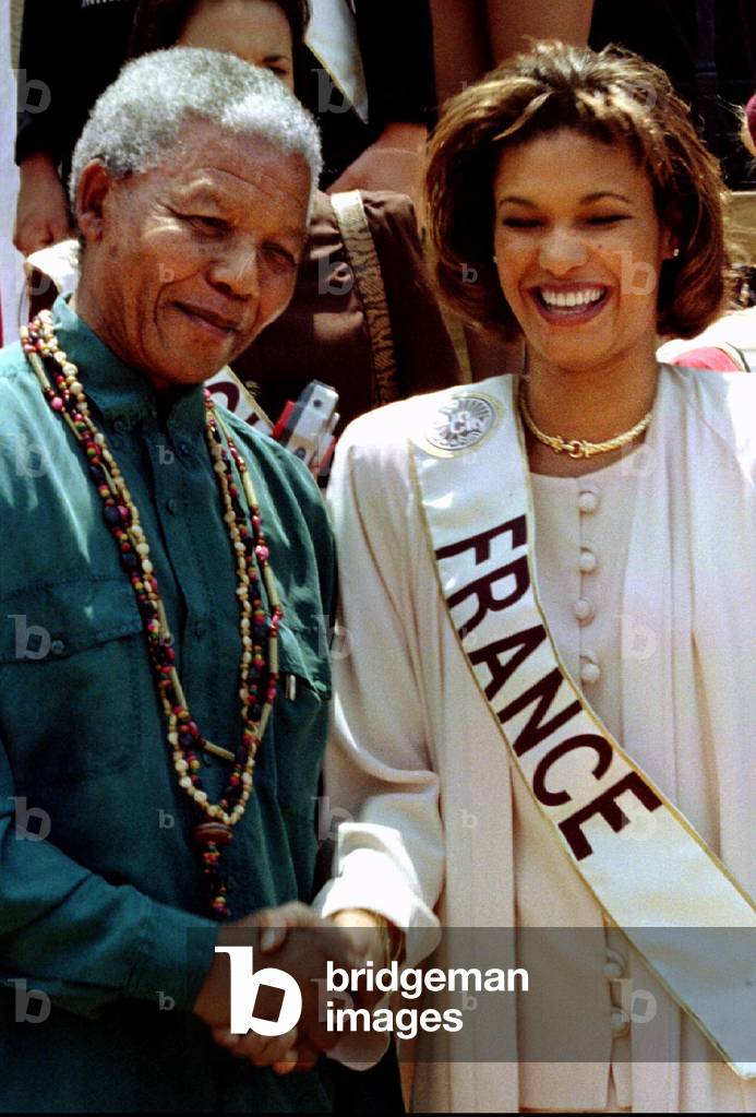 Radiah Image of South African President Nelson Mandela greets Miss France ...