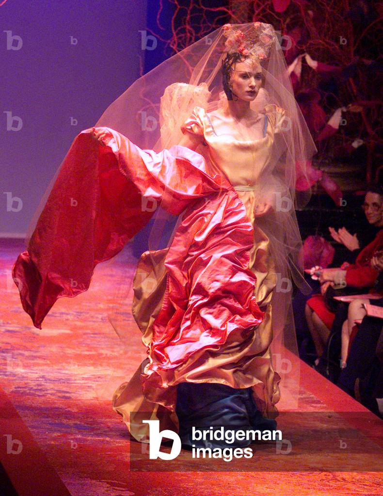 Image of A model for French designer Christian Lacroix presents this grand