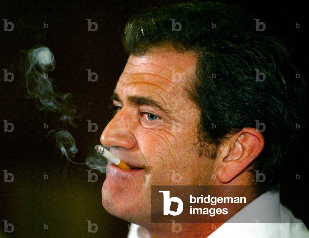 does mel gibson smoke cigarettes Image of U.S. actor and director Mel Gibson smokes a cigarette during