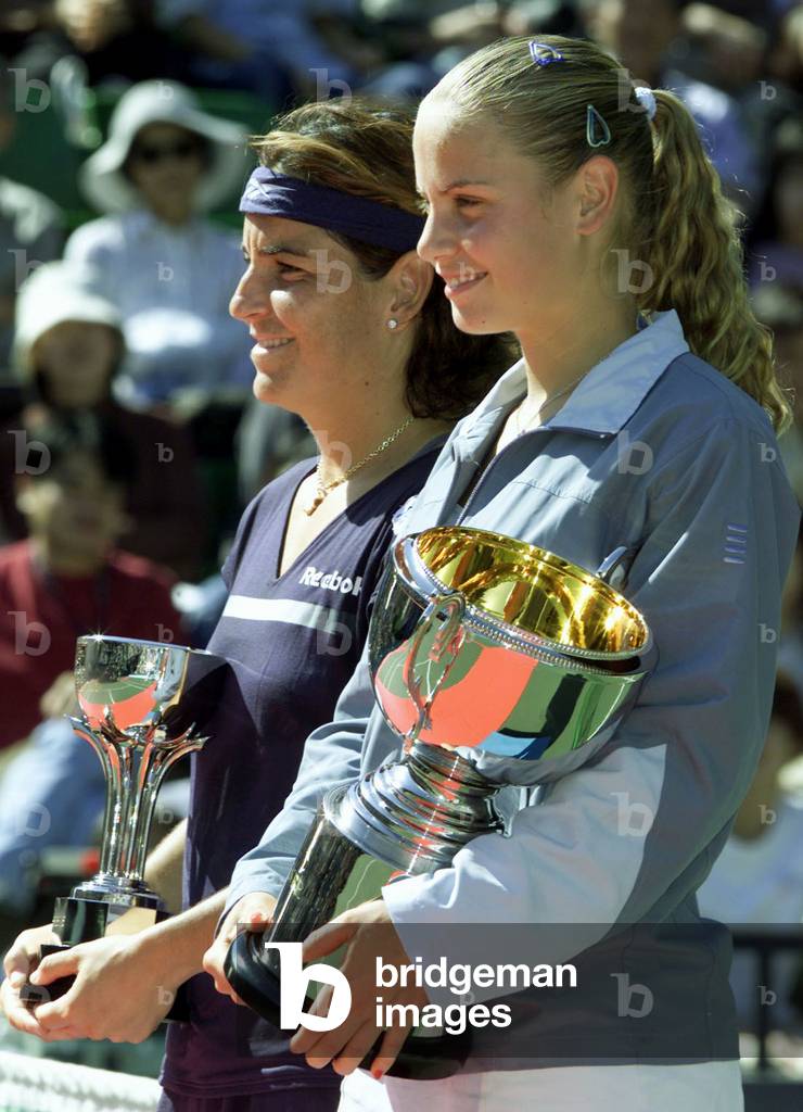 Image of SPAIN'S ARANTXA SANCHEZ AND WINNER JELENA DOKIC OF YUGOSLAVIA AT