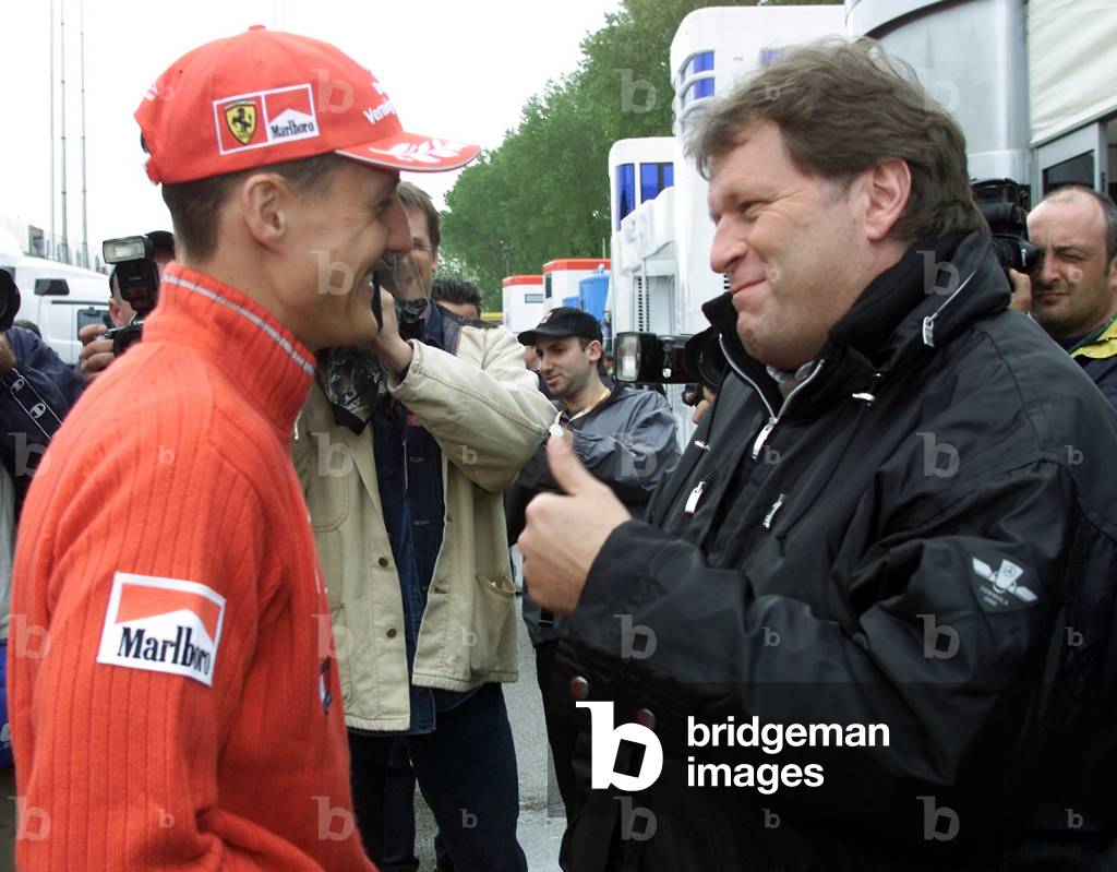 MICHAEL SCHUMACHER AND NORBERT HAUG IN THE PITS AT IMOLA TRACK, 2001-04-12 (photo)