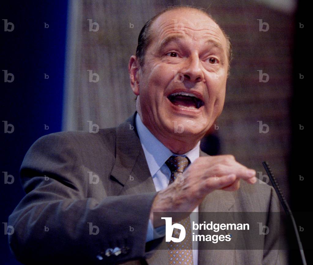 Image of French presidential candidate Jacques Chirac gestures as he delivers a