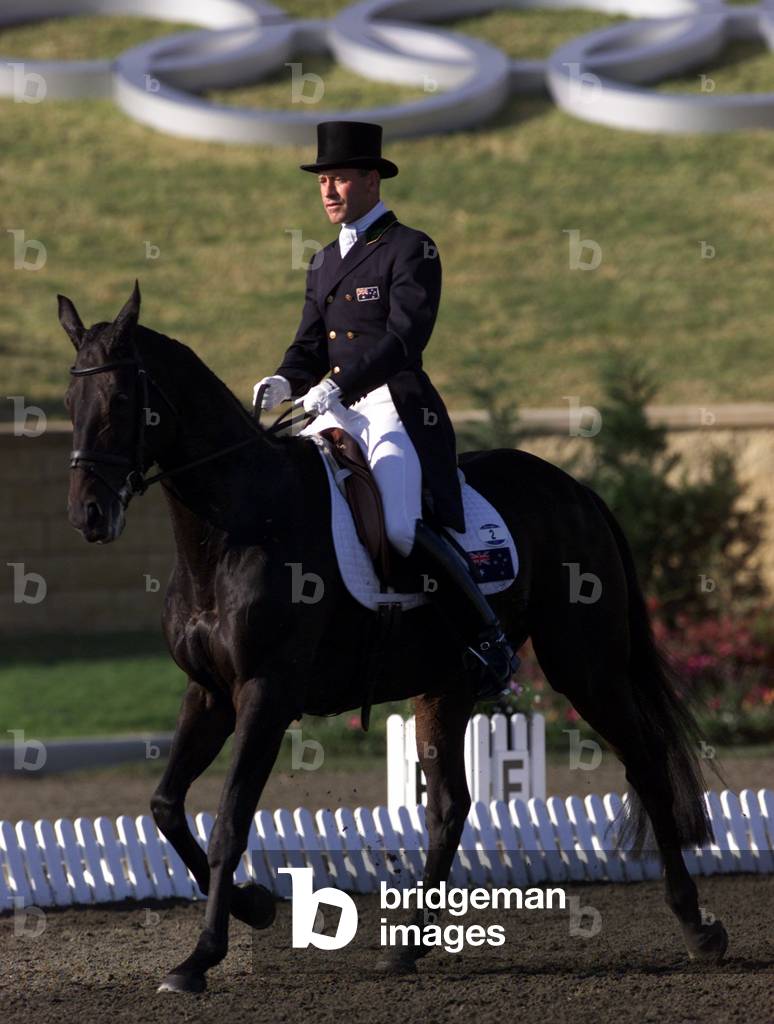 Image of AUSTRALIAN RIDER ANDREW HOY ON SWIZZLE IN DURING DRESSAGE TEST