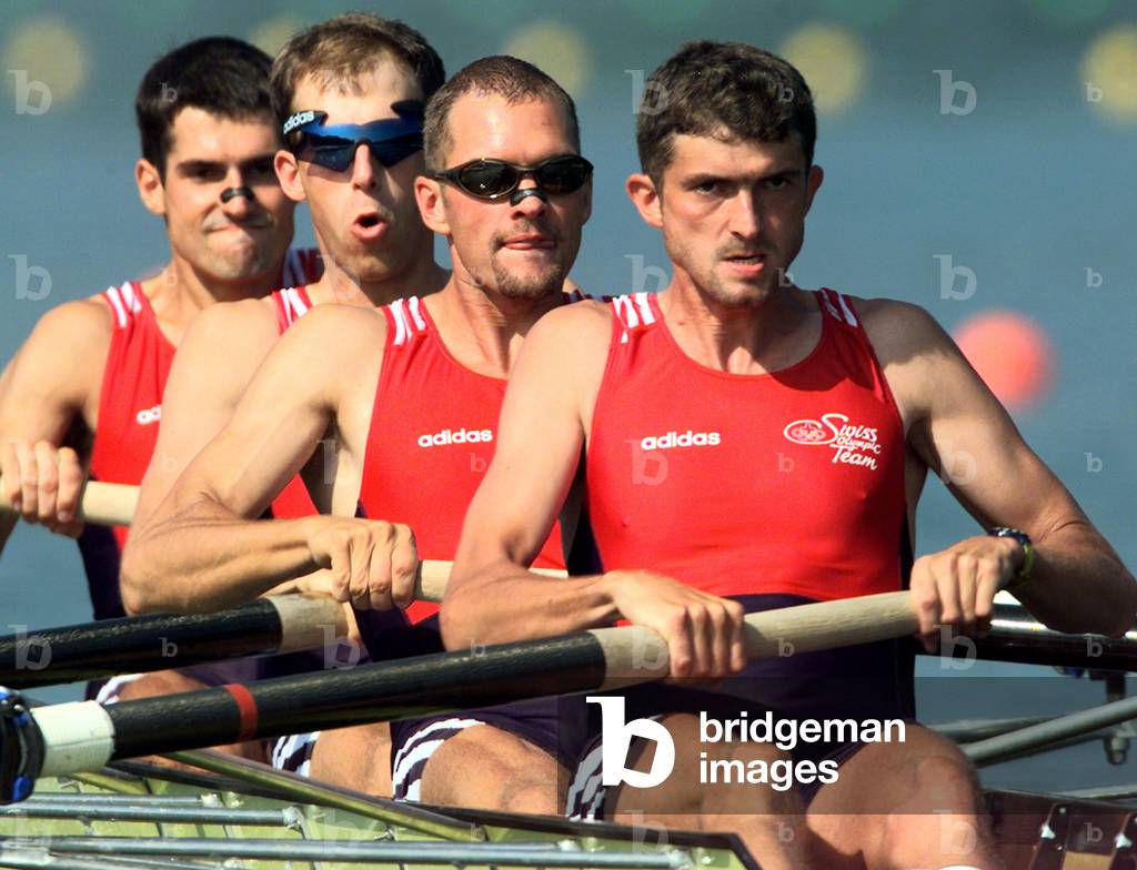 Image of Swiss men's lightweight coxless four team rows at an Olympic