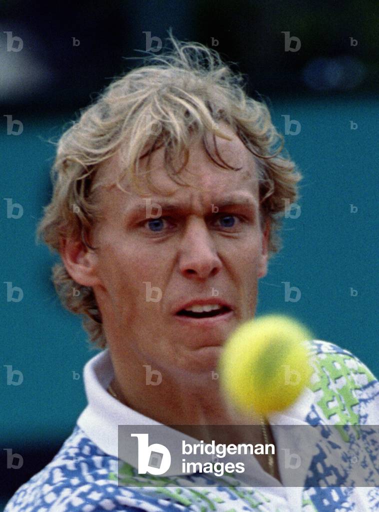 Jonas B. Svensson of Sweden looks at the ball during the French tennis open at Roland Garros stadium.., 1993-0