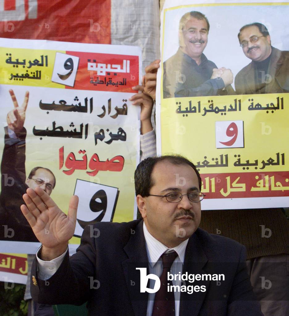 LEADER OF THE ISRAELI-ARAB HADASH PARTY AHMED TIBI ADRESSES SUPPORTERS
AS HE CAMPAIGNS IN ARARAH, 2003-01-24 (