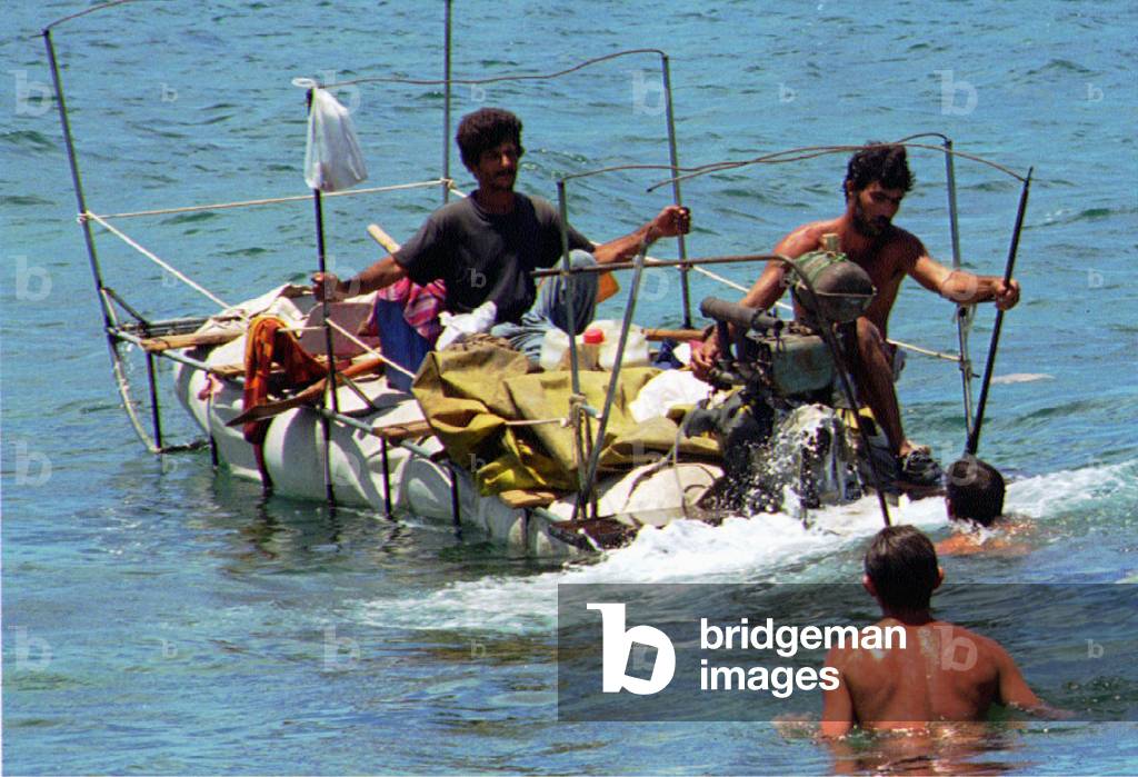 Image of Would-be Cuban refugees attempt to start the engine on their