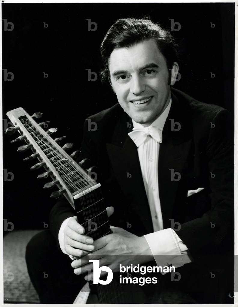 Robert Spencer holding a lute