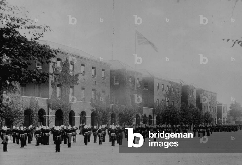 Hoisting the national flag' at the Royal Marine Barracks, Forton, Gosport, 5 September 1909 (photo)