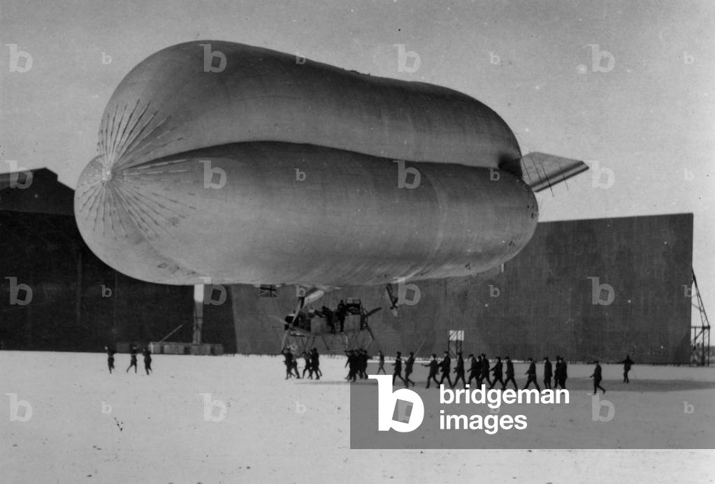 Coastal Non-Rigid Airship at RNAS East Fortune with its ground handling party, 1914-18 (b/w photo)