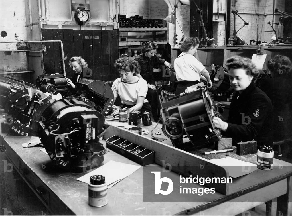 Wrens working in a mine workshop at the shore establishment HMS Vernon, Portsmouth, c.1941 (b/w photo)