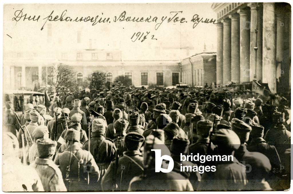 Russian photographic postcard depicting crowds of soldiers gathered in front of the Tauride Palace in Petrograd (Saint Petersburg) during the February Revolution, 1917