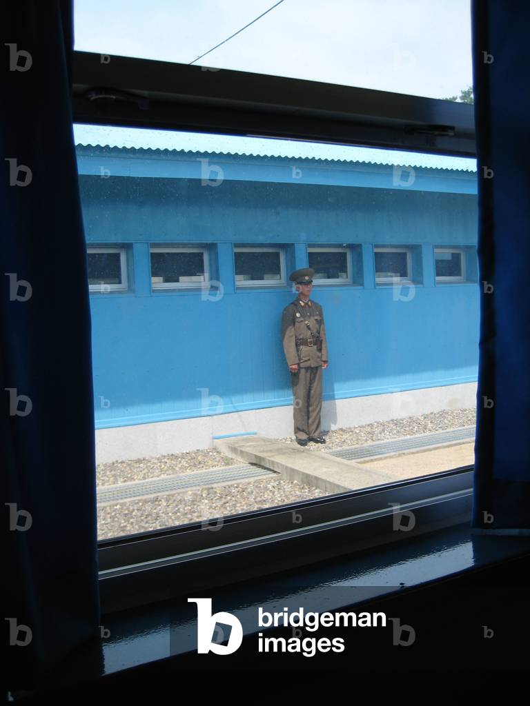 North Korean soldier guarding hut in the Joint Security Area of the Korean Demilitarised Zone, 2008 (photo)