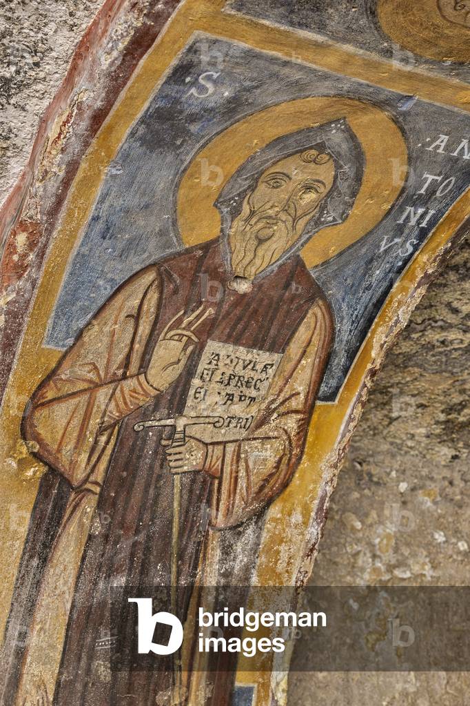 Massafra, Taranto, Puglia, Italy, The Rock Church of San Leonardo, in the urban area. Saint Anthony the Abbot, fresco (photo)