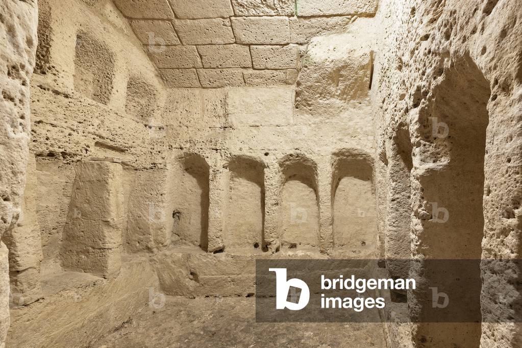 Underground cemetery at the rock-cut Church of San Pietro Barisano, Matera, Italy (photo)