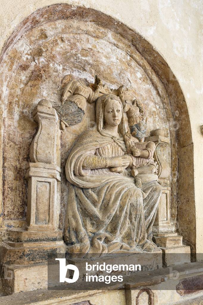 Altar of Santa Maria della Consolazione with the Madonna and Child crowned by angels and statues of different saints (carved tufa)