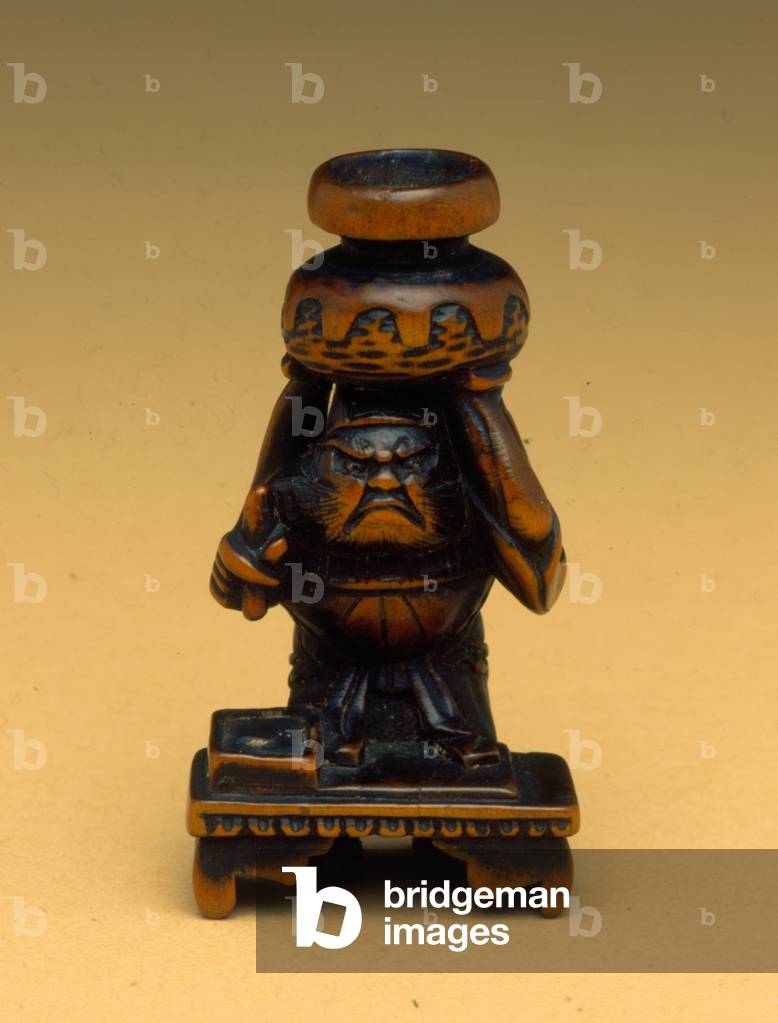 Japanese katabori-style netsuke - Goshino, the future councillor to the King of Wu and one of the Judges of Hell performing a test of his abilities, 1800-30 (boxwood)