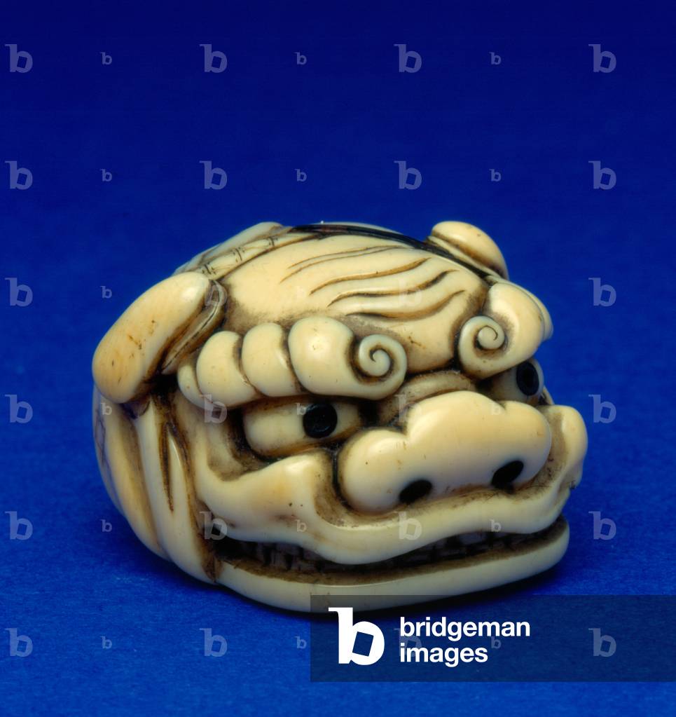 Japanese mask-style netsuke - Shishi (mythical lion) head, 1800-50 (ivory)
