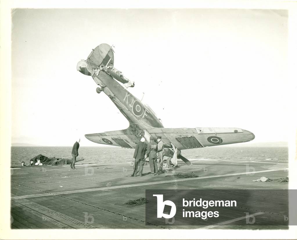 Sea Hurricane crashed on the deck of H.M.S. Ravenger, 4 October 1944 (b/w photo)