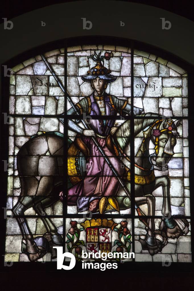 Stained glass window showing a knight on horseback at the Alcazar of Segovia, Spain (photo) 