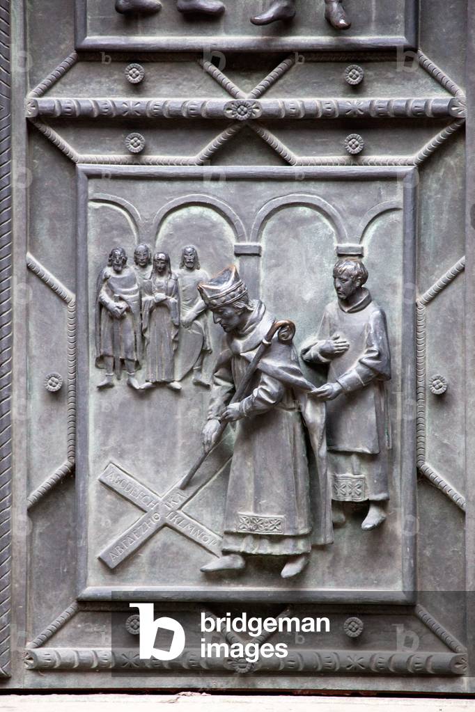 Detail of the bronze door of the central portal in the western facade, depicting the consecration of the Basilica, cast c.1926-29, St. Vitus Cathedral, Prague (photo)