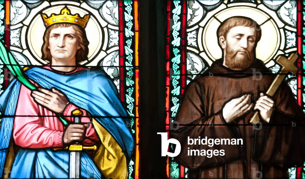 Stained glass window depicting two standing Holy Men (photo)