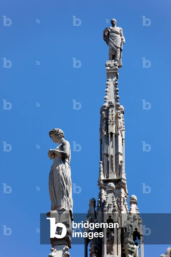Statues on spires, Milan Cathedral, Italy, 2010 (photo)