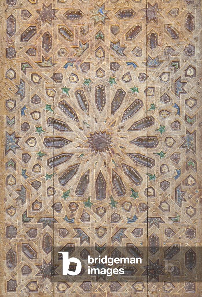 Painted wooden door at the Bahia palace, Marrakech, Morocco