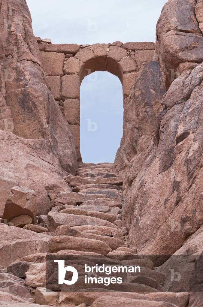 Some of the 3750 steps of repentance with an archway on the route to the summit of Mount Sinai