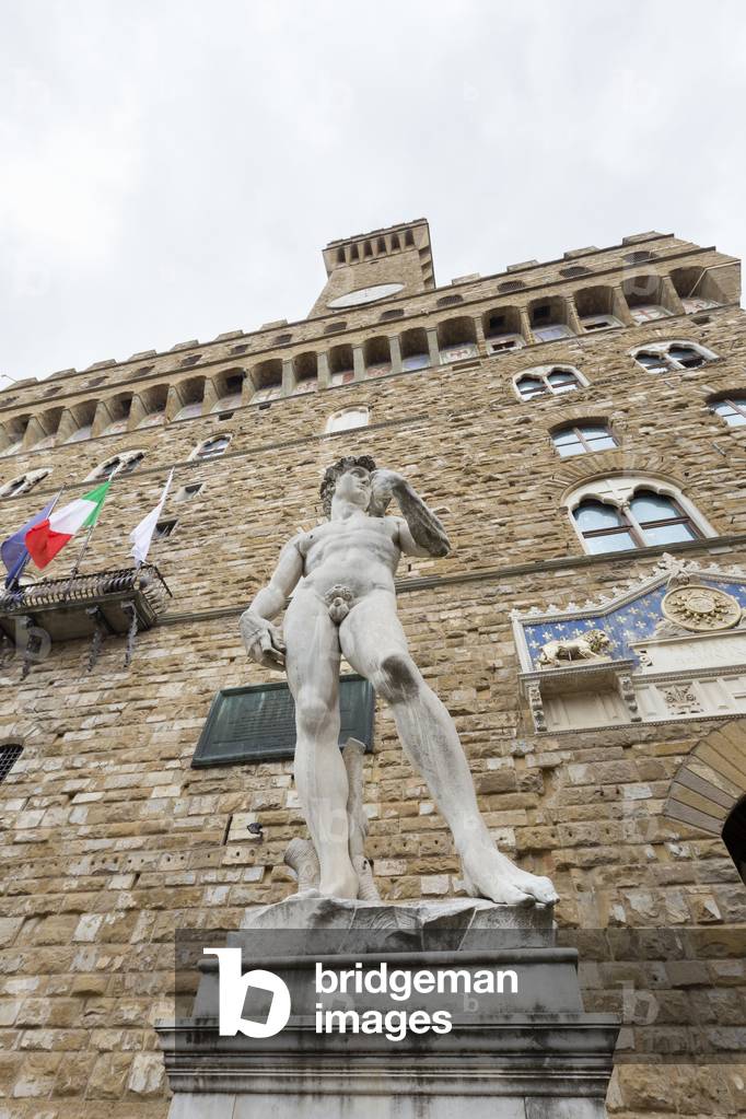 Copy of Michelangelo's David statue at Palazzo Vecchio overlooking Piazza della Signoria, Florence, Italy