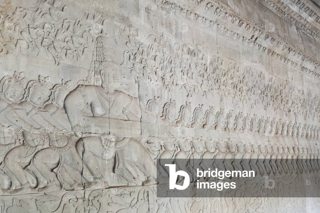 Bas relief depicting the churning of the ocean of milk, Angkor Wat, Cambodia (photo)