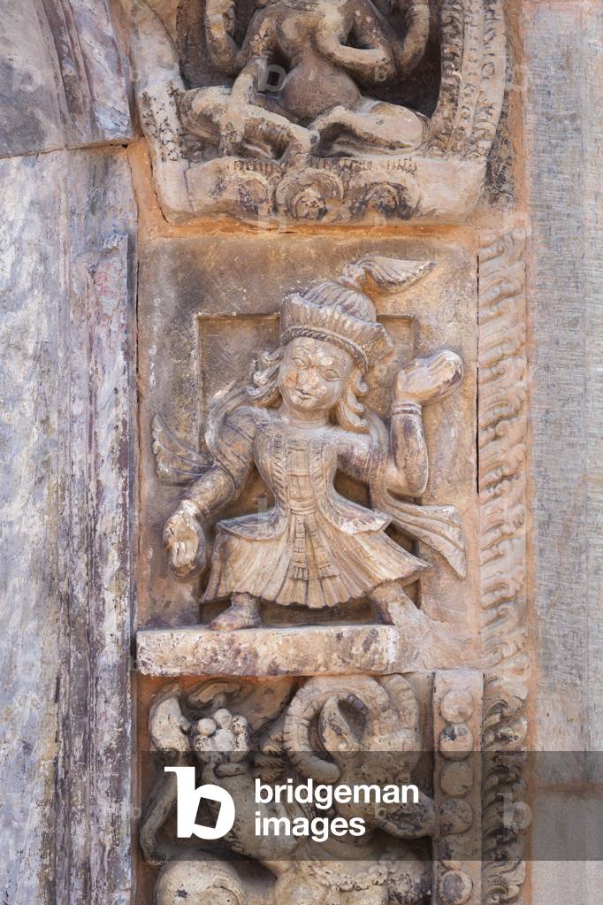 Detail of Hindu carvings on the entrance door to the royal palace, Durbar Square, Patan, Nepal (photo)
