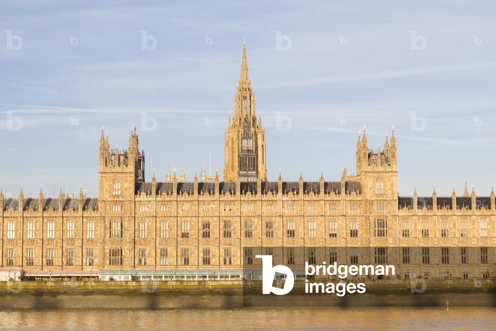The houses of parliament bathed in early morning light, London, England