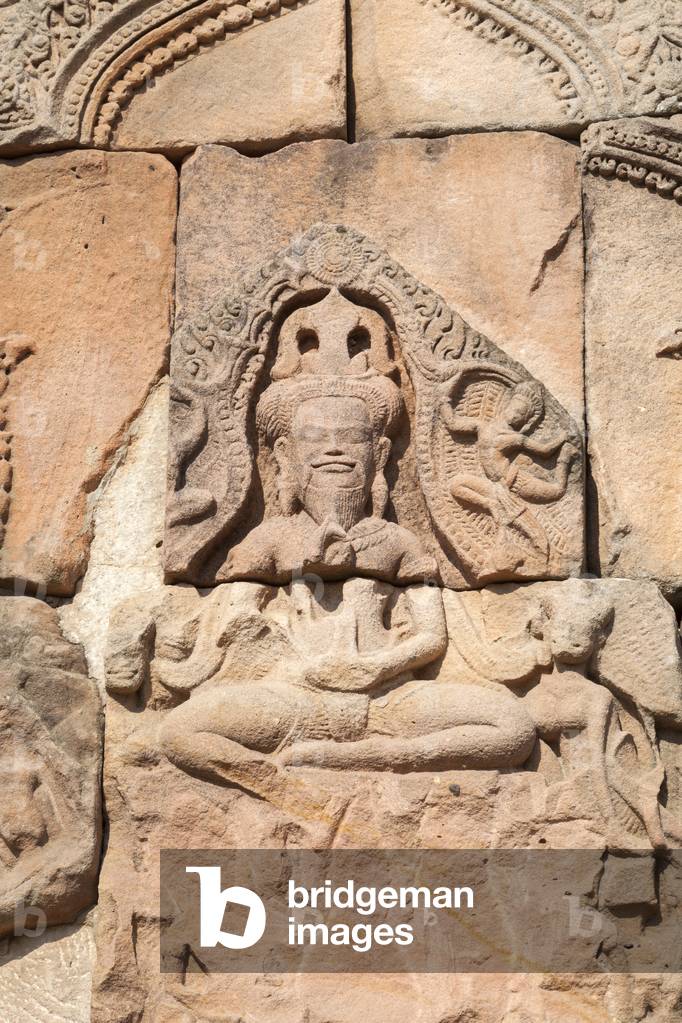 Detail of the pediment depicting Shiva in his aspect of Yoga Dakshinamurti (teacher of yoga) at the main doorway of Prasat Hin Phanom Rung temple, Phanom Rung historical park, Buriram province, Thailand