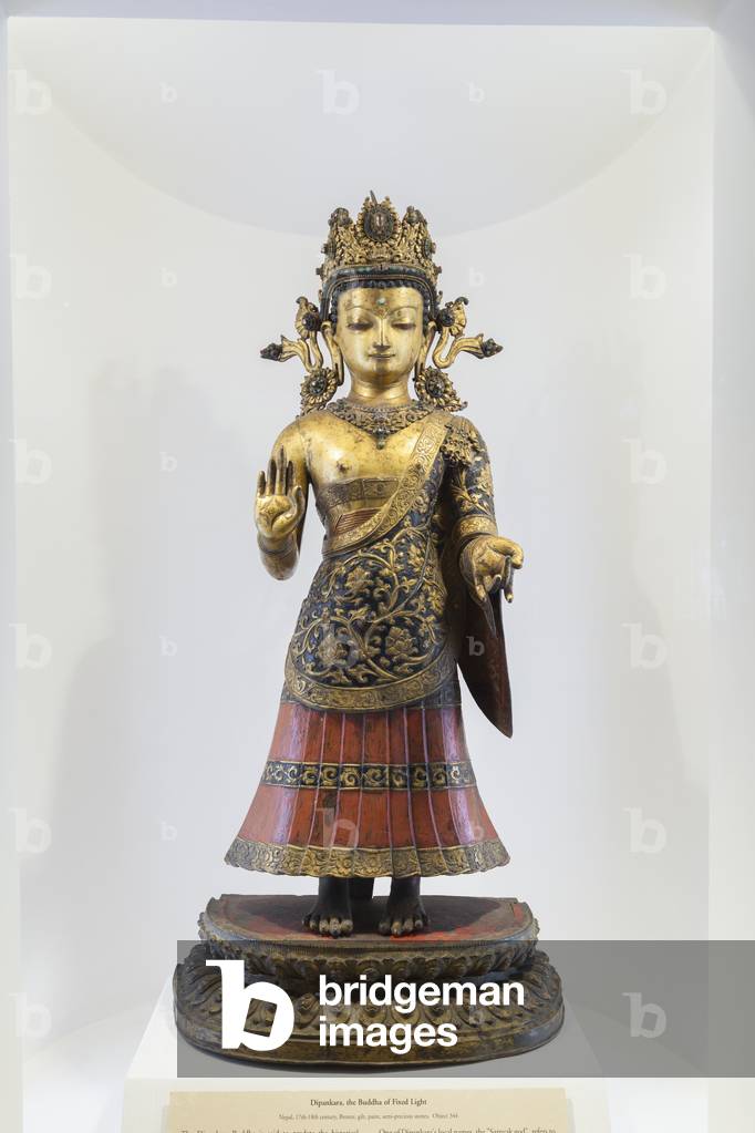 Dipankara, the Buddha of fixed light, Nepal (bronze, gilt, paint and semiprecious stones)
