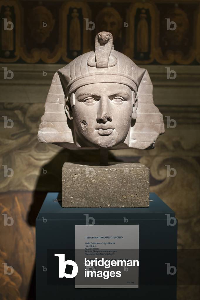 Head of Antinous in Egyptian style, 130-138 AD (red quartzite)