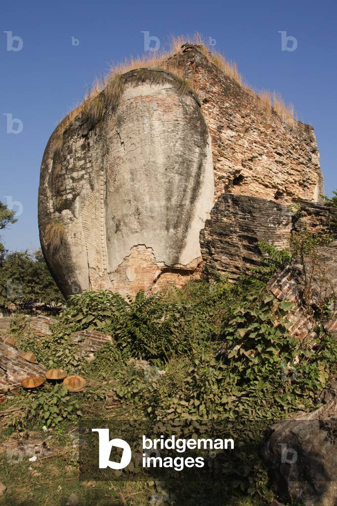 Part of Giant Chinthe Statue destroyed by Earthquake, Pa Hto Daw Gyi Buddhist Brick Pagoda, Mingun, Mandalay Division, Myanmar (photo)