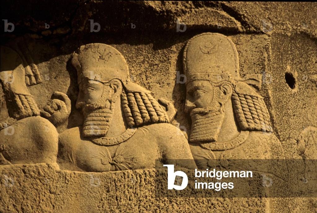 Carved heads , relief at Naghsh -e -Rostam, Iran