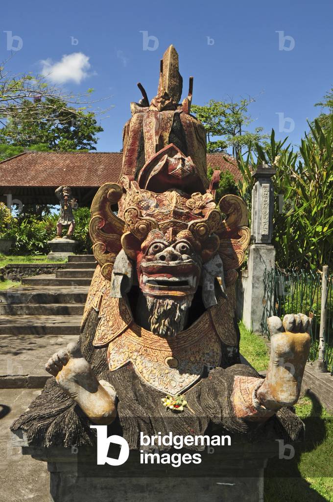 Bali, Karangasem, ancient Water Palace, Taman Tirta Gangga, 1948, built by the last King of Karangasem. Indonesia Large pool with stepping stones and statues of dancers.