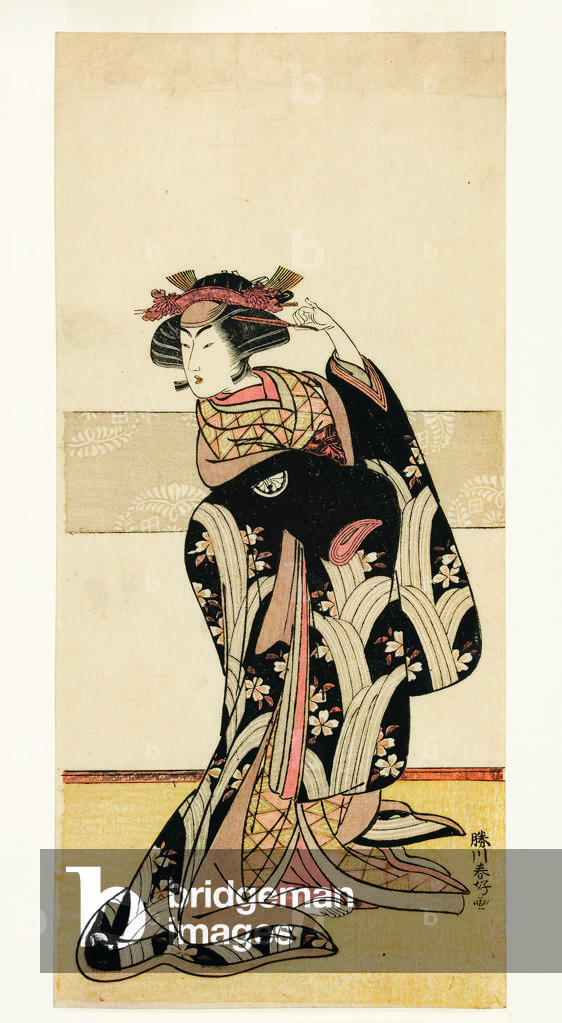 The actor Segawa Kikunojo III in a female role, 1774-76 (woodblock)