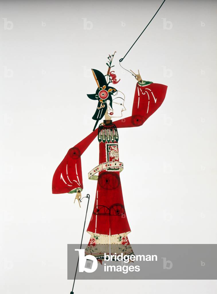 Shadow puppet, late 19th - early 20th
century (leather, paint, wood, and wire)