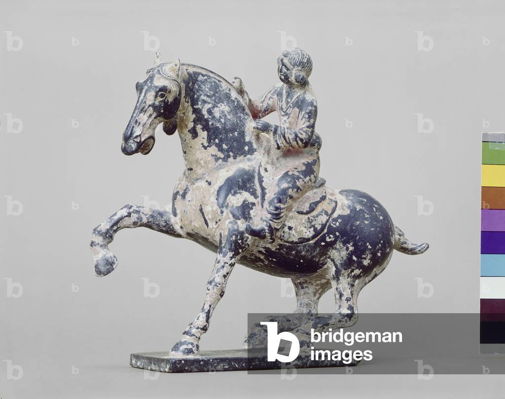 Black stone horse and rider, early 7th - 10th
century (Stone and gesso)