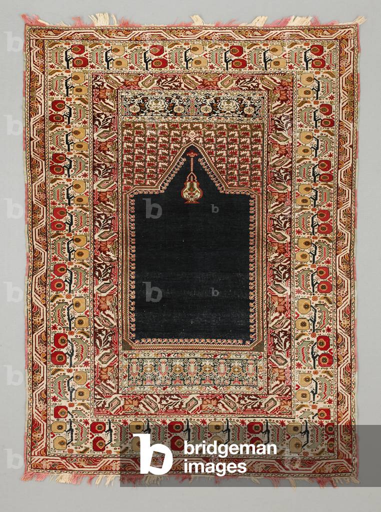 Ghiordes pattern prayer rug, late 19th-early
20th century (Pile-woven wool)