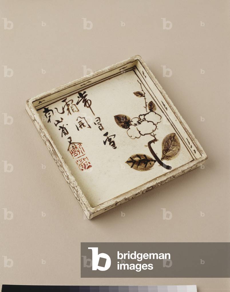 Cake plate with plum design, early 18th
century (ceramic with iron oxide and clear glazes)